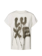 White t-shirt with 'LUXE' spray paint design on a white background