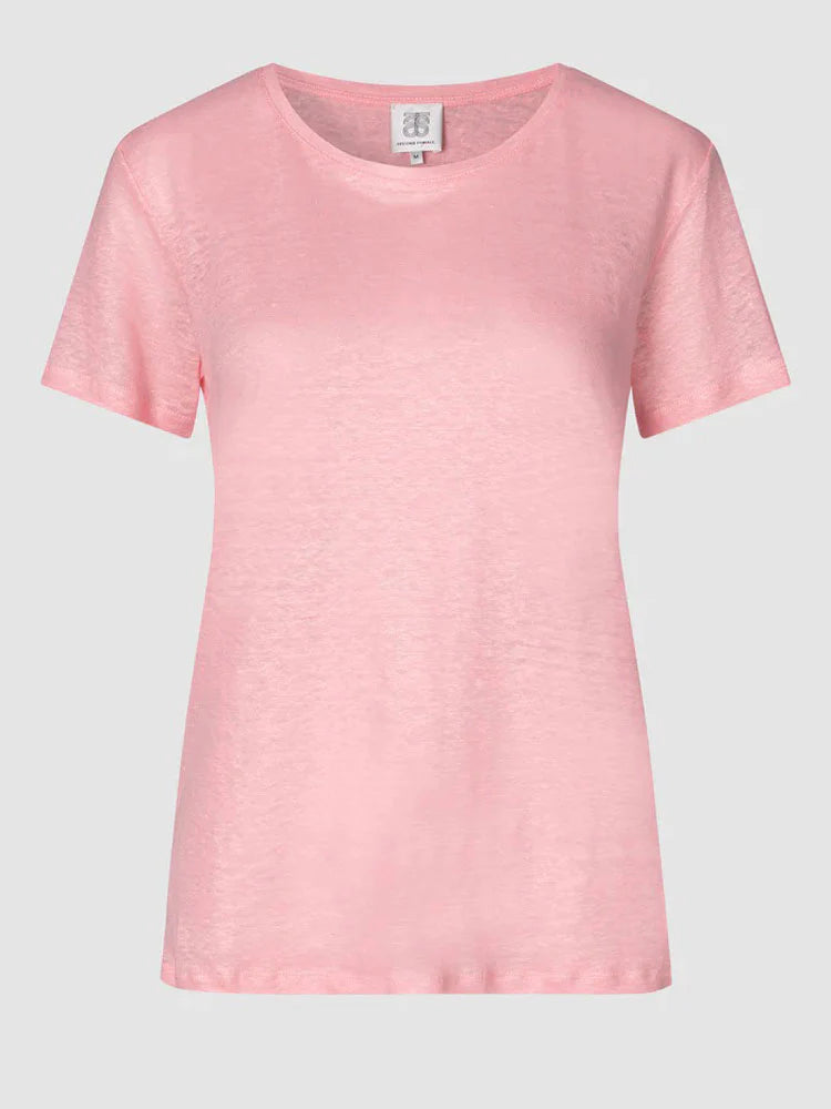 Pink t-shirt on a light gray background