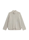 Knitted cardigan on a white background