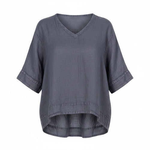 A slate gray short-sleeve V-neck top with a relaxed, oversized fit and a slightly asymmetrical hem, shown against a plain white background.