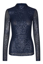 A dark blue, long-sleeved tube top with sequins, paired with a matching mini skirt.