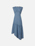 A blue denim midi dress with cap sleeves, an empire waist, and shirred panels leading into an asymmetrical skirt.