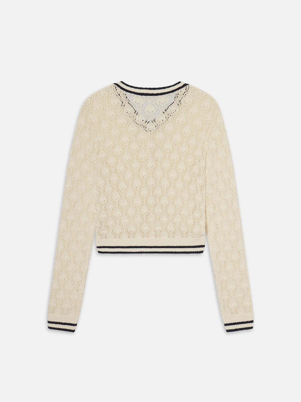 Beige sweater with black trim on a white background