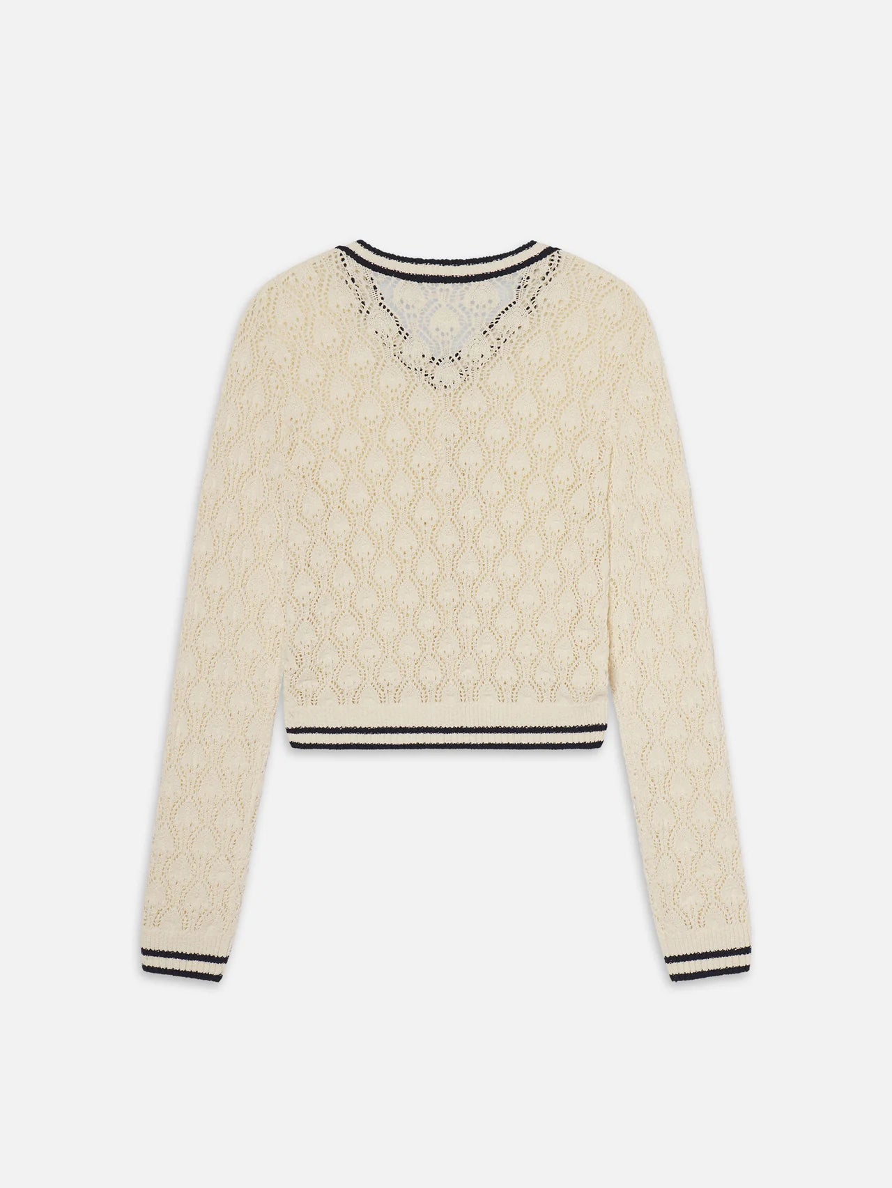 Beige sweater with black trim on a white background