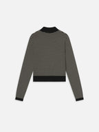 Black and white striped sweater on a white background