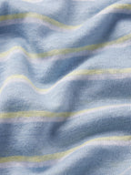 Close-up of blue fabric with yellow stripes