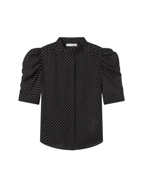 Black blouse with white polka dots on a light gray background. Gillian Top Blouse Frame brand