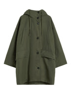 Green coat with button details on a white background