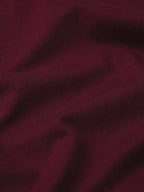 Close-up of dark purple fabric texture