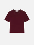 Maroon t-shirt on a light gray background