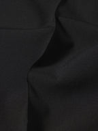 Close-up of black fabric with folds