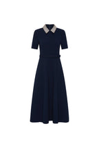Navy dress with a patterned collar on a white background