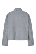 A cropped long-sleeve jacket with a vertical stripe pattern in gray and white, shown from the back on a plain white background.