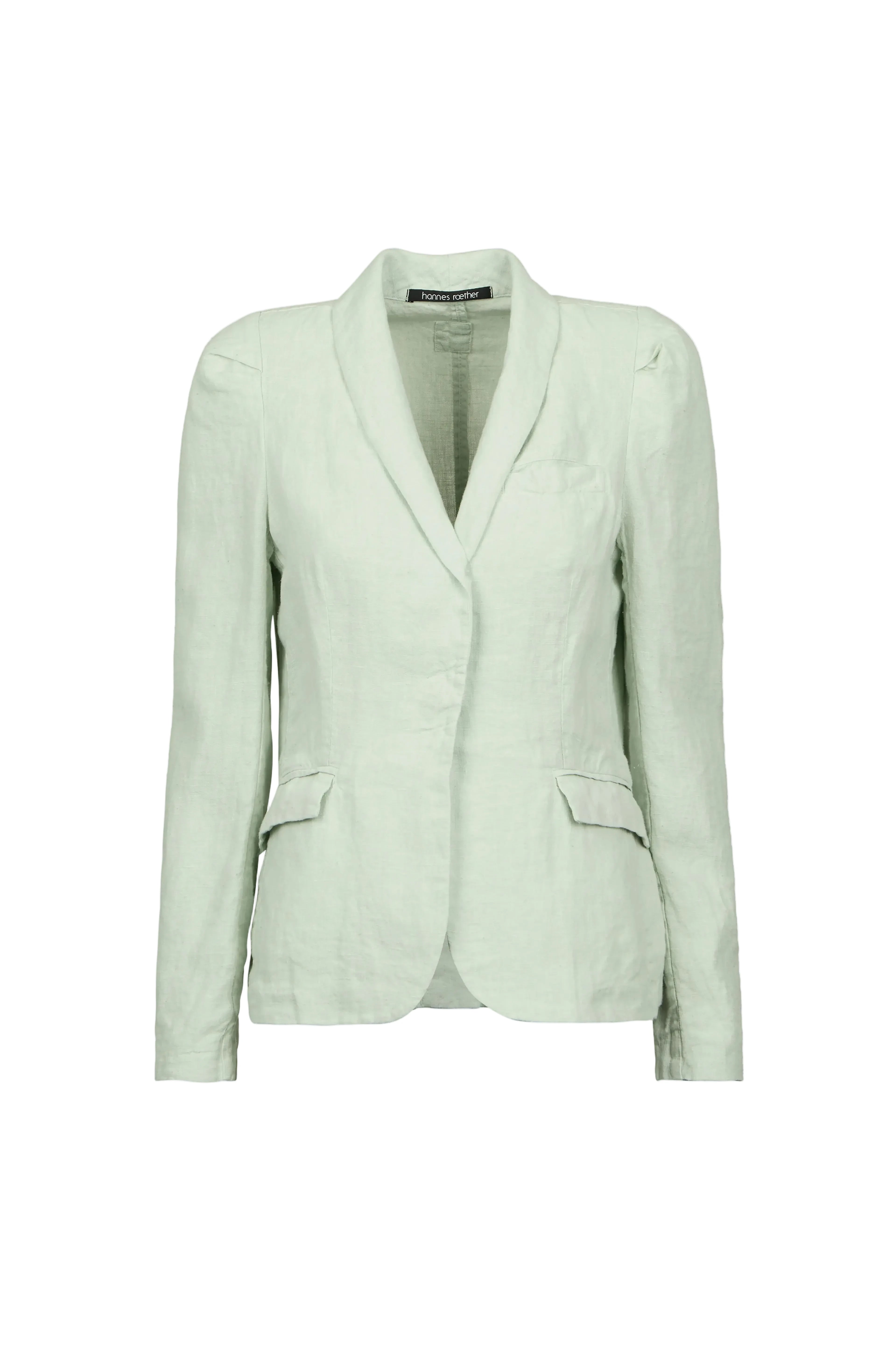 A light sage green tailored blazer by Hannes roether with a shawl collar, structured shoulders, and flap pockets, shown on a plain light blue background.