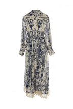 Floral patterned dress with long sleeves on a white background