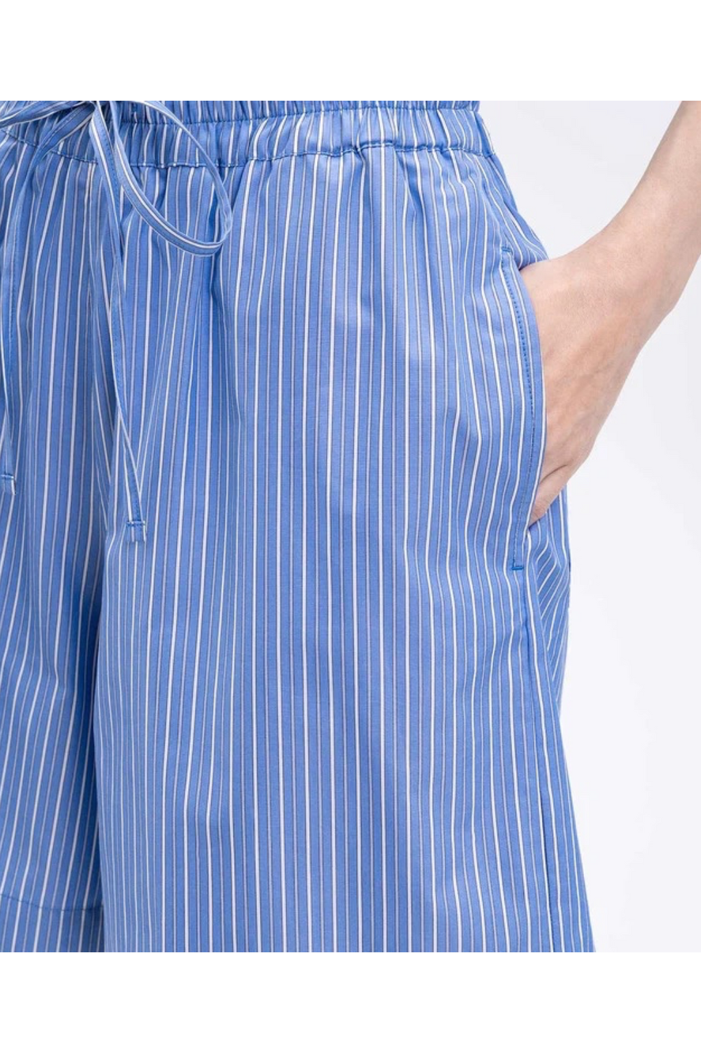 Blue and white striped pants on a white background