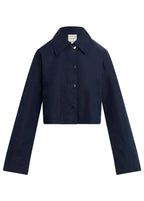 Navy blue jacket on a beige background