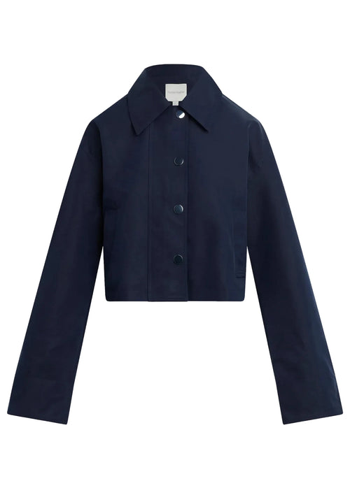 Navy blue jacket on a beige background
