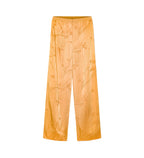 Orange jacquard texture wide leg  pants on a light gray background