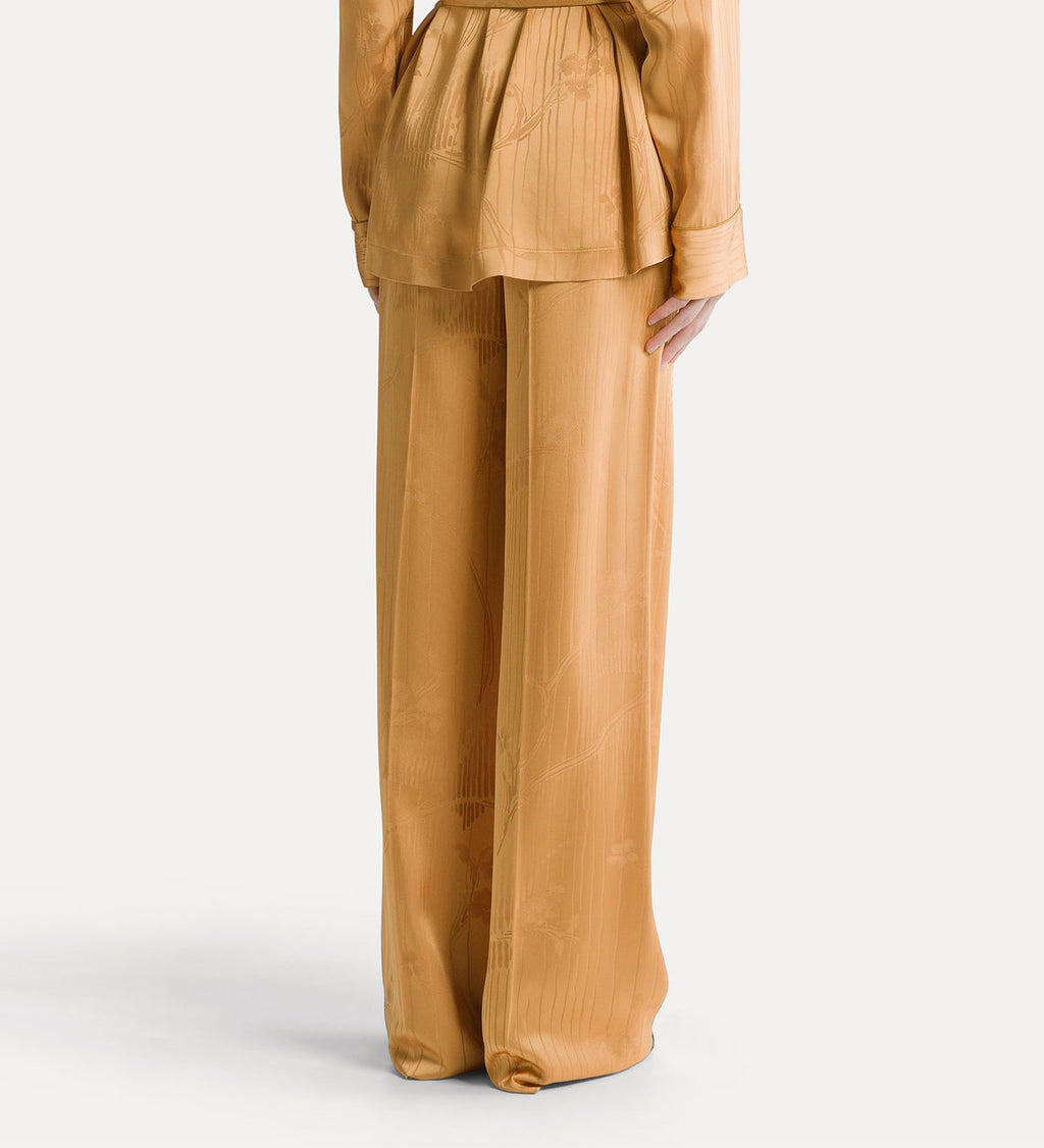Tan suit with wide-leg pants on a white background