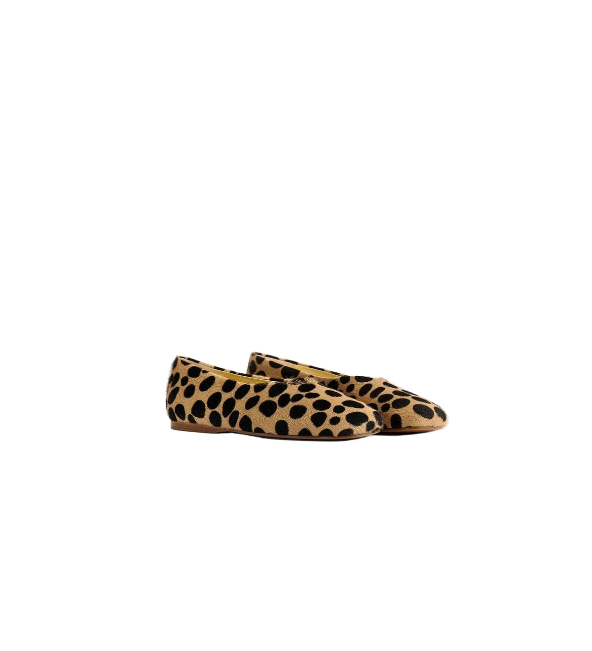 Pair of leopard print flats on a light gray background