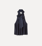 Navy blue sleeveless top with a bow detail on a light gray background
