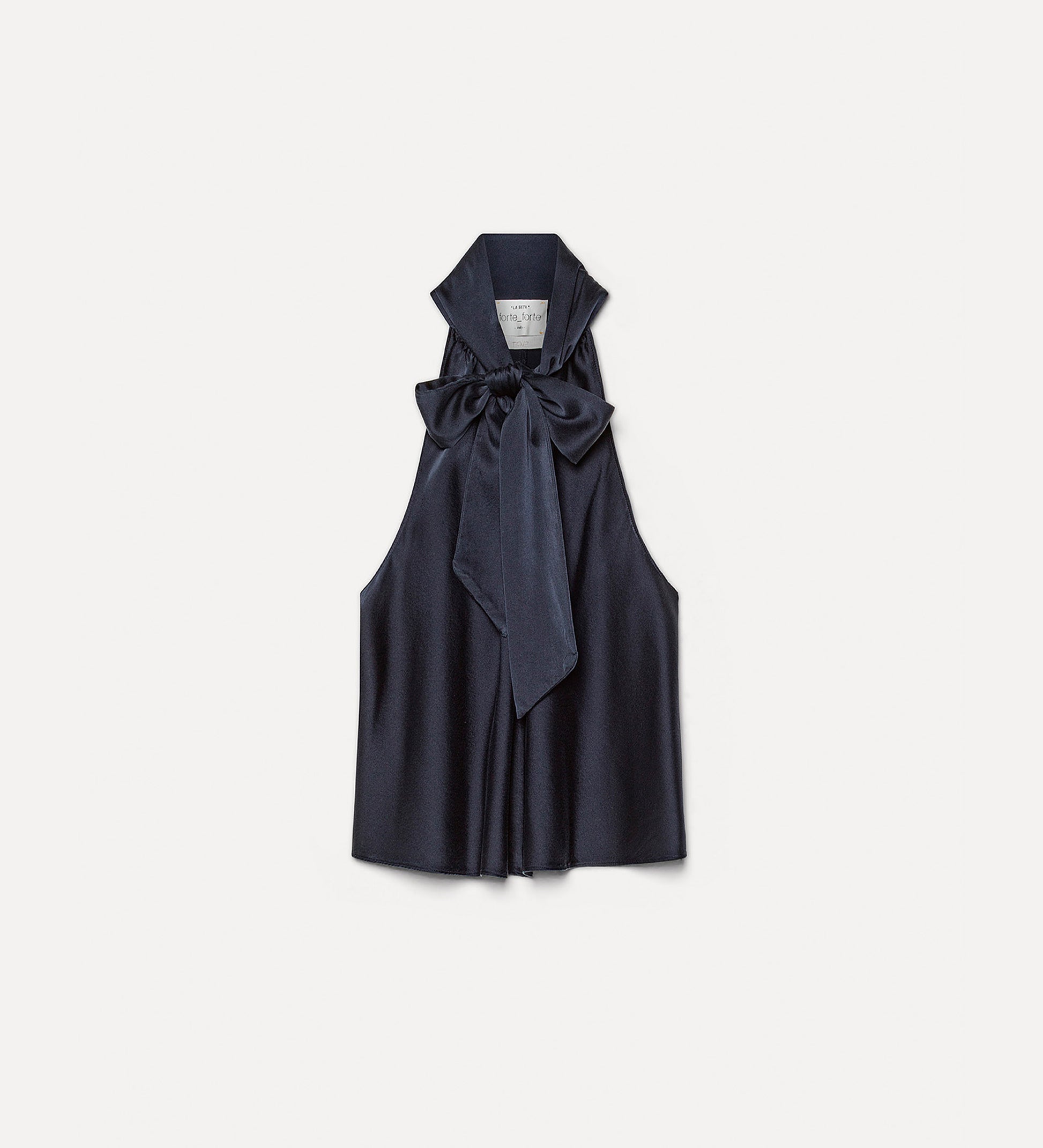 Navy blue sleeveless top with a bow detail on a light gray background