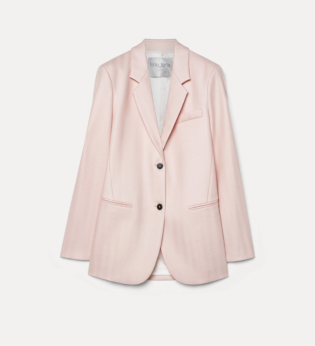 Pink blazer with black buttons on a light gray background