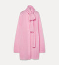 Pink coat with a matching scarf on a light gray background
