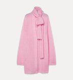 Pink coat with a matching scarf on a light gray background