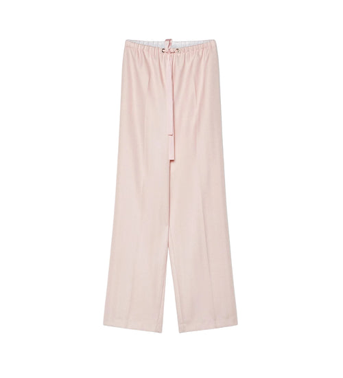 Light pink pajama pants on a white background
