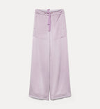 Lavender wide-leg pants on a light gray background