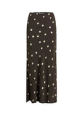 Black skirt with white polka dots on a white background