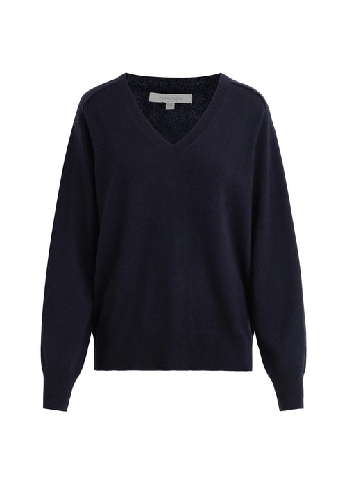 Navy blue sweater on a white background