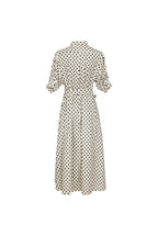 A cream-colored midi dress with a black polka dot pattern, featuring short puff sleeves and a button-up collar, shown from the back against a light blue-gray background.
bet28ter-k.4061
Hannes Roether