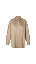 Beige shirt on a white background
