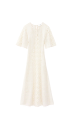 White dress with a subtle pattern on a white background