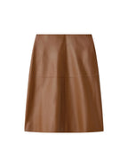 Brown leather skirt on a light gray background