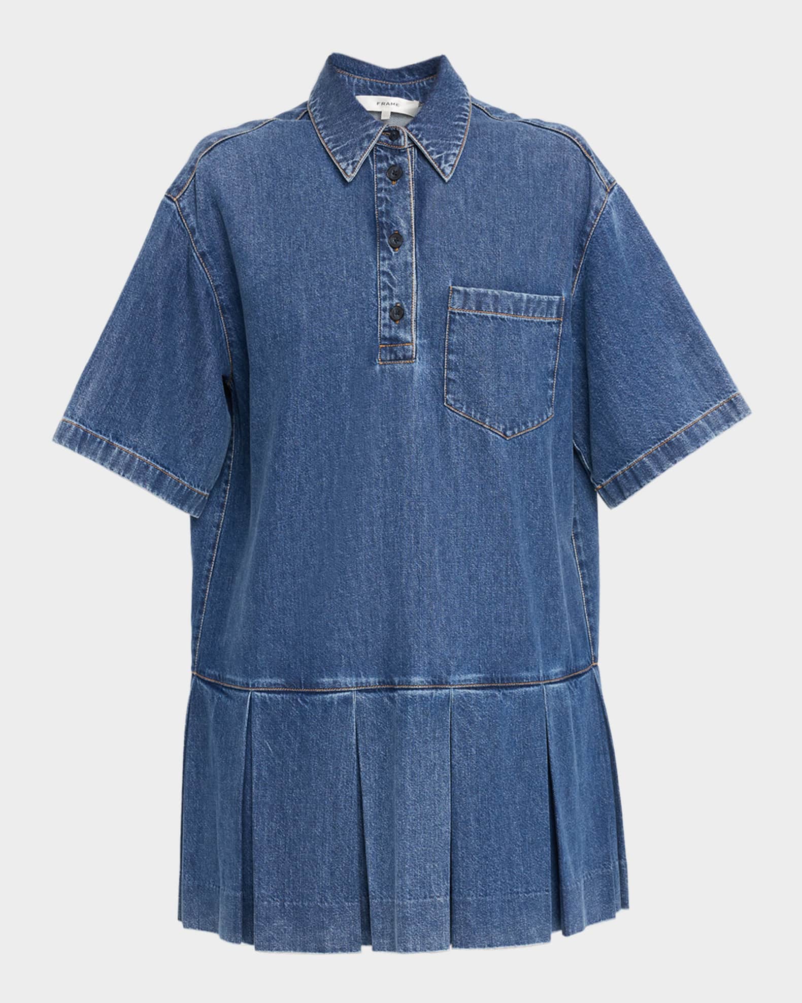 Blue denim dress with pleated skirt on a light gray background