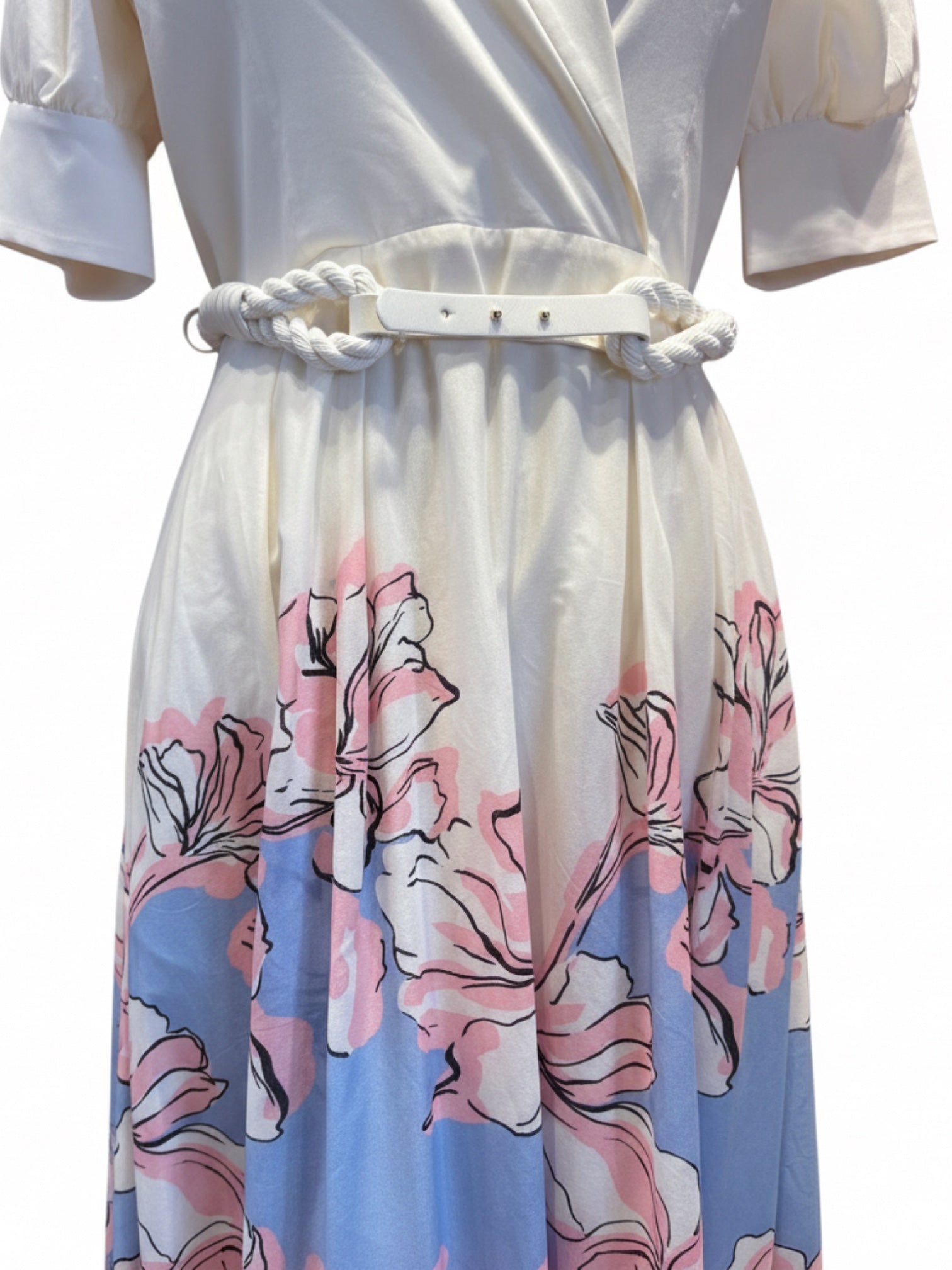 White dress with floral pattern on a white background