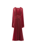 Red pleated dress on a light gray background