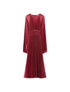 Red pleated dress on a light gray background