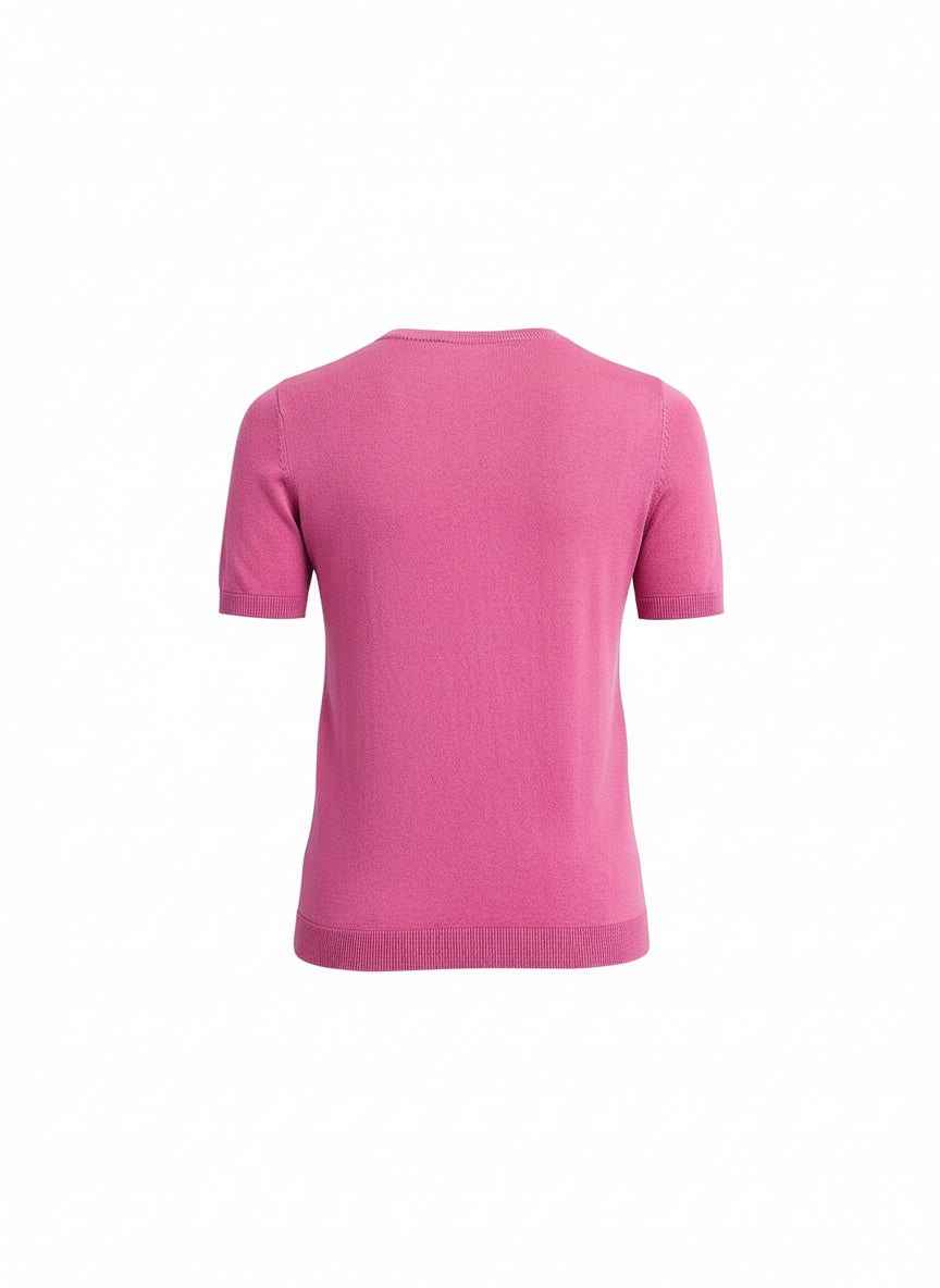 Pink sweater on a white background