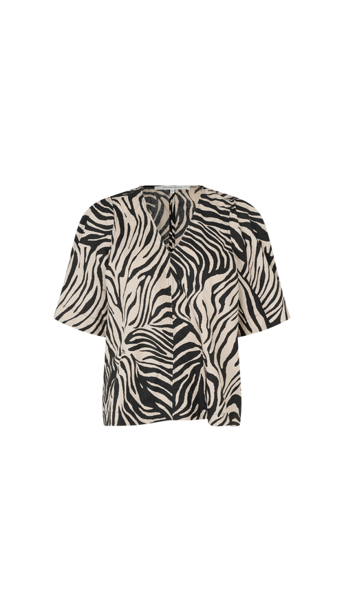 Zebra print top on a white background