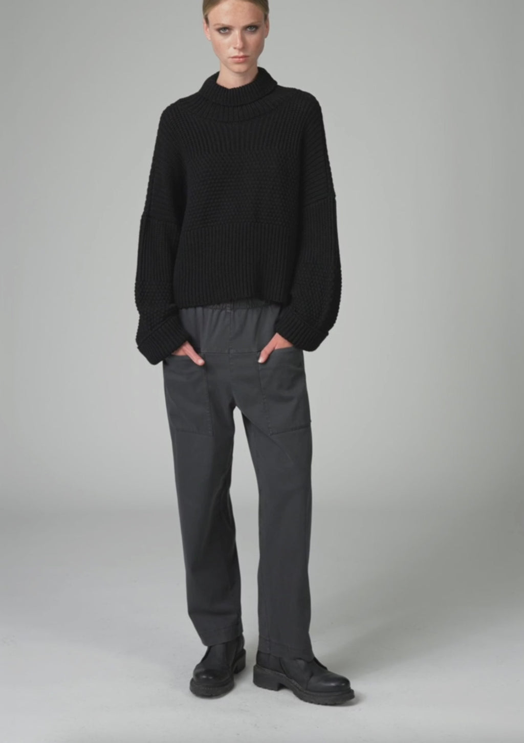 Pure wool chain stitch knit with ribbed turtleneck