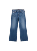 Blue jeans on a white background.saige wide leg crop
