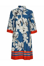 Floral dress with blue, white, and red pattern on a white background
