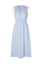 A light blue and white vertically striped sleeveless midi dress with a smocked waist, tie-shoulder neckline, and a V-neckline, shown against a plain white background.