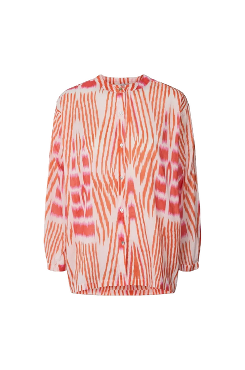 A long-sleeve button-up shirt featuring a vibrant coral pink and orange abstract ikat-like pattern on a white background, displayed against a solid white backdrop.