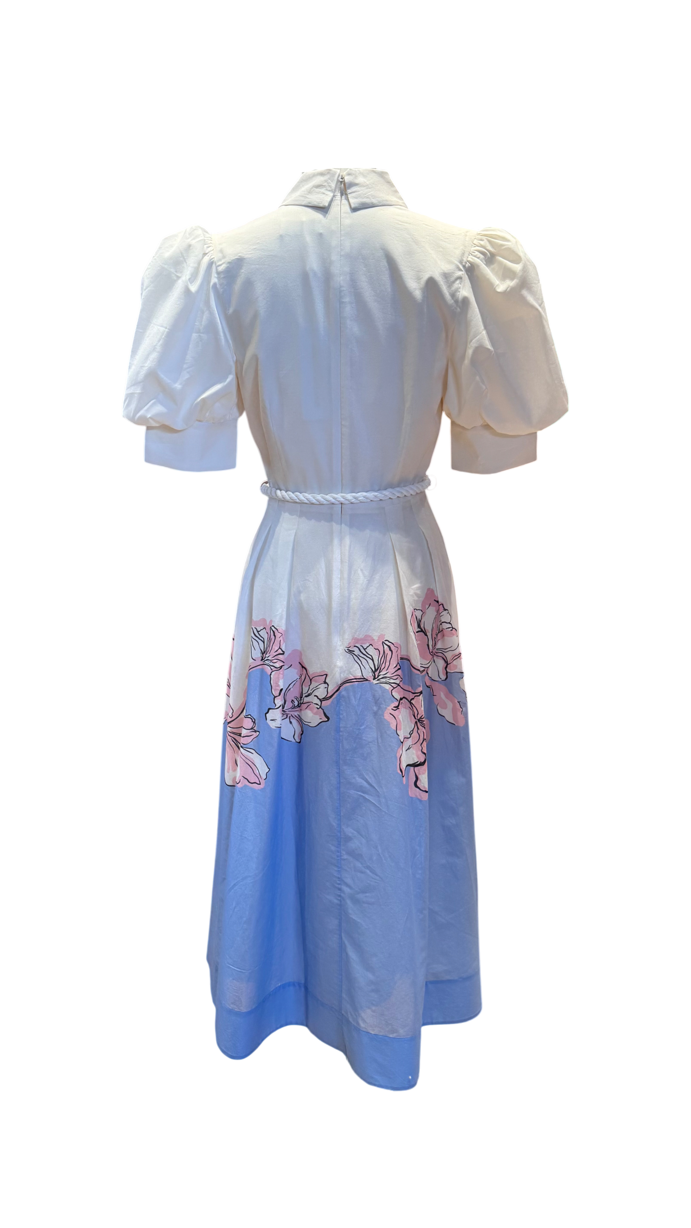 Light blue dress with floral embroidery on a white background